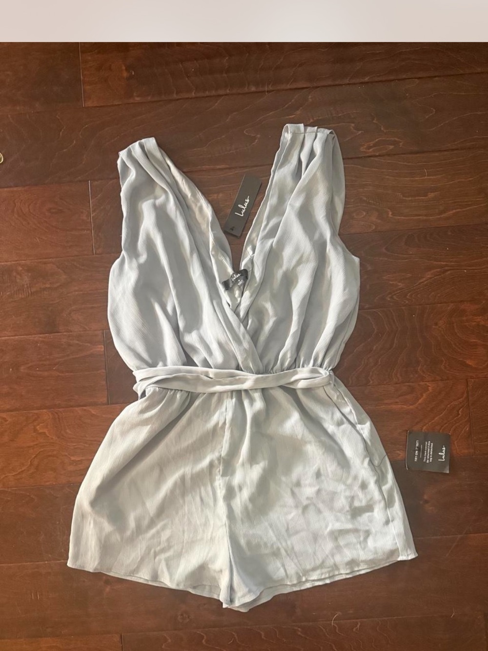 Lulu's Pale Blue Sleeveless V-Neck Tie-Waist Romper